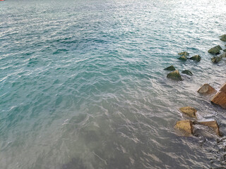 Concrete breakwater blocks on the coastline