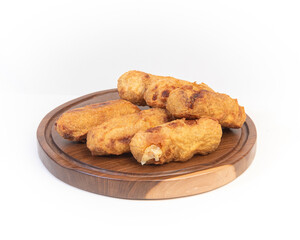 six aborrajado  over a wood table isolated white