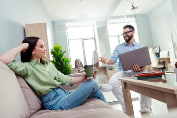 Fototapeta premium Photo of positive good mood employers dressed shirts enjoying coffee break indoors workshop workstation