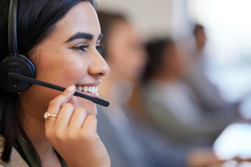 Call center, close up and woman with smile, headphone and communication in office. Happy, telemarketing agent and discussion in workplace for deal, consulting and technology for customer service