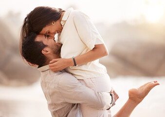 Love, carry and couple at beach with hug on vacation, adventure and holiday for valentines day....