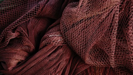 Stacked waving fishing net as background