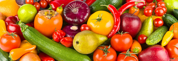 A set of fruits and vegetables. background. Wide photo.