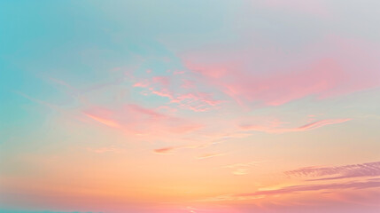Obraz premium Serene Pastel Sky at Sunrise with Soft Spreading Colors of Pink, Blue, and Yellow Creating a Tranquil Morning Scene