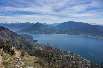 Wonderful views on a walk above the picturesque Lake Annecy. Route along the ridge from Mont Veyrier to Mont Baron from Annecy. Annecy, Haute-Savoie, France.