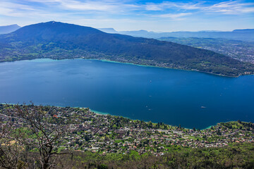 Wonderful views on a walk above the picturesque Lake Annecy. Route along the ridge from Mont Veyrier to Mont Baron from Annecy. Annecy, Haute-Savoie, France.