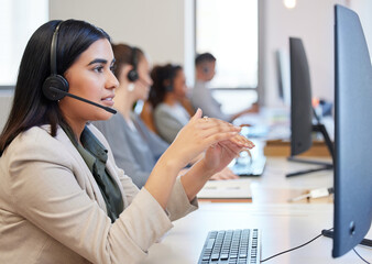 Call center, discussion and woman with headphone, computer and communication in modern office....