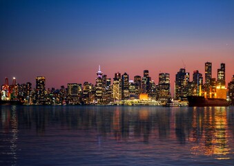 Naklejka premium City skyline panorama and reflection in water. Vancouver. BC. Canada