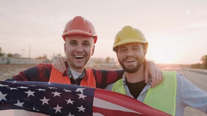 Portrait of happy American males working on site