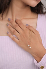 Beautiful young woman with stylish jewelry earring 