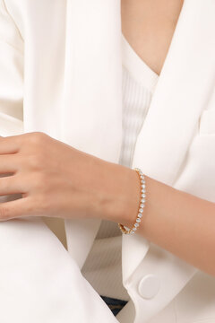 Diamond jewelry. Diamond bracelet on young woman