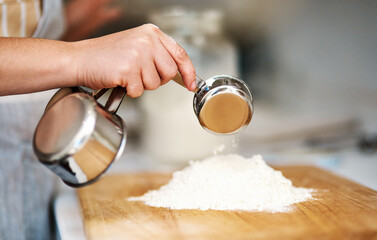 Hands, kitchen and flour for baking, home and glass bowl for dessert or small business. Baker,...