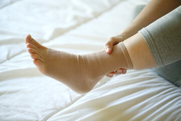 Close-up image of a foot with bandage anklet