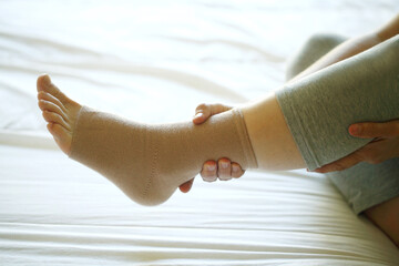 Close-up image of a foot with bandage anklet