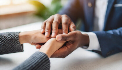 two hands gently holding each other, symbolizing support, empathy, and connection, conveying a sense of comfort, love, and mutual care in a moment of need