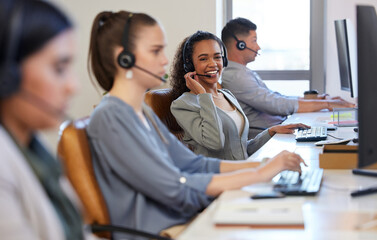 Portrait, woman and colleagues in a call center office for customer service, consulting and business crm. Female advisor and staff, inbound telemarketing and microphone to listen, help and support