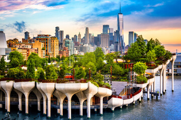 View of Lower Manhattan skyline at sunset, behind the Little Island public park.