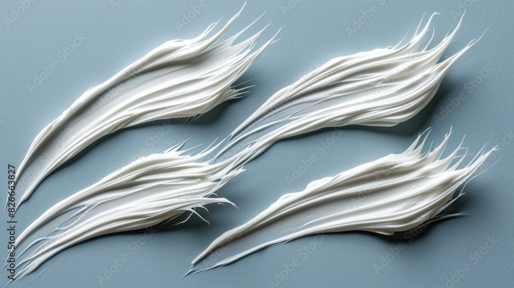 Aufkleber a close up of four white brush strokes, each with a different length and angle. the brush strokes ap
