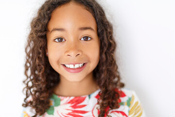 An Adorable black american little girl with beautiful hairstyle