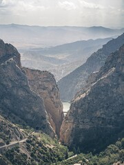 An overlook aerial view of the El Caminito Del Rey hiking route in the canyon of the Guadalhorce river, as seen from the Mirador De Las Buitreras lookout point
