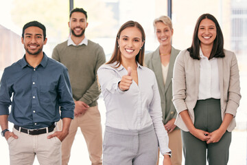 Smile, thumbs up and portrait of business people in workplace in collaboration for team building. Happy, approval and group of professional creative designers with support hand gesture in office