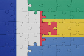 puzzle with the colourful national flag of gabon and flag of france.