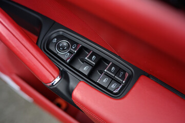 Car Window and Side Mirror Control Switches Close-Up
