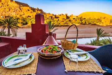 Tajine or Tagine, traditional Moroccan dish, delicious food for lunch in clay dish on restaurant table in Ait Ben Haddou, Morocco, North Africa, Morocco, North Africa