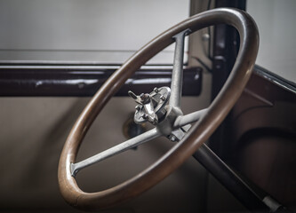 Obraz premium Dashboard and steering wheel of old-timer car