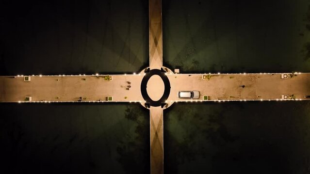Top Down over Pier in Durres from a drone at night, Adriatic Sea, Albania, Europe