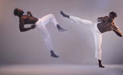 Sports, martial arts and black man with kick in studio for karate fitness, action exercise or...