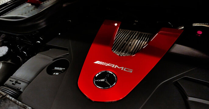 Moscow Russia - May 21, 2024: Bright red trim with AMG lettering on the Mercedes-AMG engine cover.