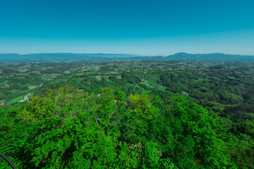 Obraz premium Scenic panorama from Wooden lookout tower called Stolp Ljubezni or Tower of Love, close to Sentjur pri Celju in Slovenia, Lookout tower on the edge of a hill at the edge of forest