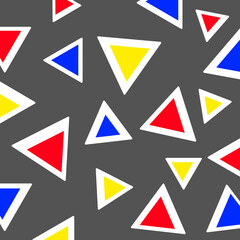 Red, yellow, and blue triangles with white outlines on gray background