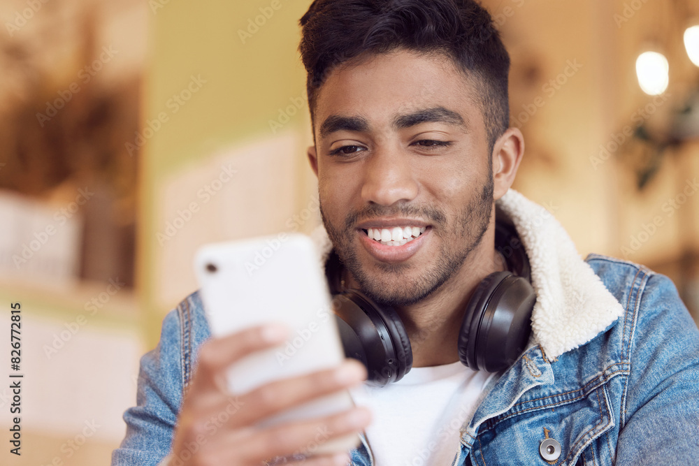 Poster man, happy and typing on smartphone in cafe, browse and internet search or smile for message notific