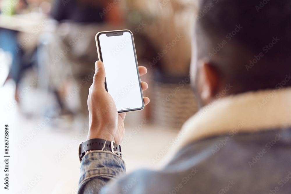 Aufkleber man, back and smartphone screen in coffee shop, mock up and message notification or relax with tech 