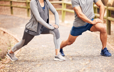 Couple, stretching legs and start for exercise in outdoor, fitness and preparation for running....