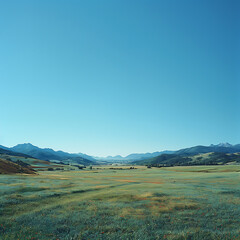 Fototapeta premium Intimate Aerial View: Serene Empty Canvas amidst Vibrant Blue Green Valley