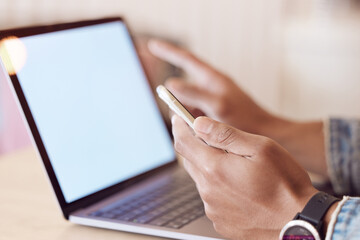 Person, hands and laptop or smartphone with screen, browsing and freelancer for remote work with blank communication. Blog, display and networking website working, internet search or copywriter