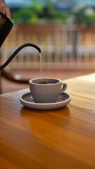 Pouring hot water to make drink