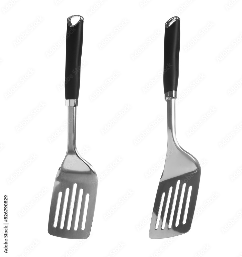 Wall mural two spatulas isolated on white. cooking utensil