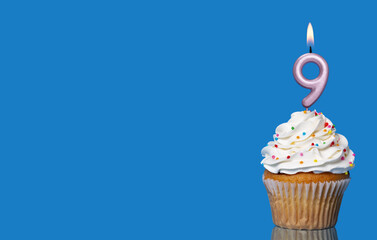 Birthday Cupcake With Candle Number 9 Lit.