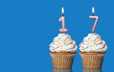 Birthday Cupcakes With Candles Lit Forming The Number 17