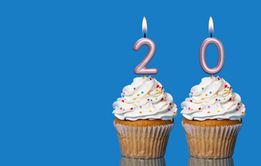 Birthday Cupcakes With Candles Lit Forming The Number 20