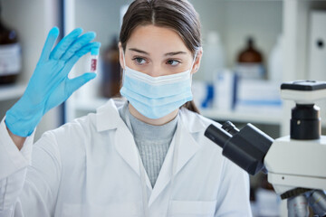 Woman, student and blood sample with scientist research and university lab with study. Medical, education and pathology with virus and chemistry project with tube and college classroom with mask