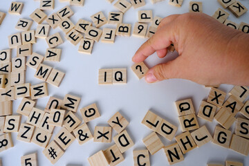 word IQ, wooden letters on wooden table, intelligence quotient on wooden background, quantitative...