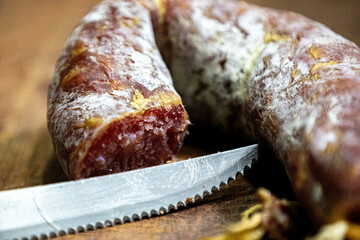 Rustic Blumenau salami, aged smoked and with probiotic mold on the surface