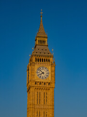 golden big ben under sunset light