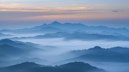 Obraz premium The image shows a beautiful mountain landscape with a sea of clouds below