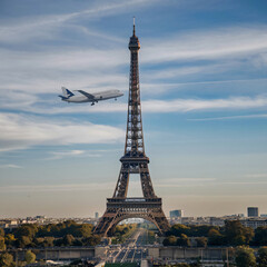 Eiffel Tower with flying airplane